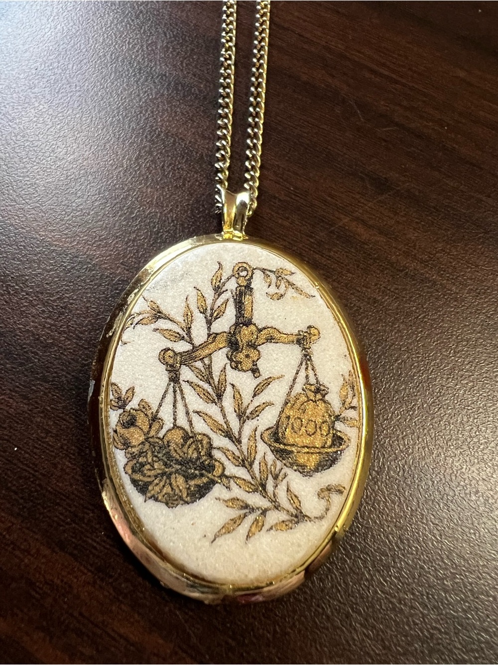 Gold-Tone Oval Pendant Necklace with Scales & Floral Motif
